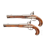 A pair of silver-mounted flintlock pistols, Wittemann in Gie&szlig;en, circa 1750
