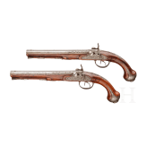 A pair of double-barreled percussion pistols with profuse chiselling, G. A. Moritz in Zella St. Blasii, circa 1820/30