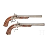 A pair of cased percussion pistols, Li&egrave;ge, circa 1850