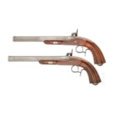 A pair of cased percussion pistols, Li&egrave;ge, circa 1850