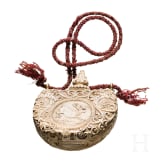 A German carved powder flask made of ivory, 19th century