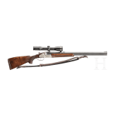 An over-and-under Scheiring-D&uuml;sel combination rifle with insert barrel and Schmidt & Bender scope