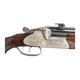An over-and-under Scheiring-D&uuml;sel combination rifle with insert barrel and Schmidt & Bender scope