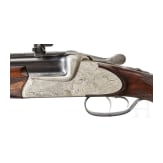 An over-and-under Scheiring-D&uuml;sel combination rifle with insert barrel and Schmidt & Bender scope