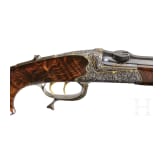 A cased deluxe break-action rifle by Karl Hauptmann, Ferlach, with Zeiss scope