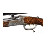 A cased deluxe break-action rifle by Karl Hauptmann, Ferlach, with Zeiss scope