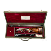 A cased deluxe break-action rifle by Karl Hauptmann, Ferlach, with Zeiss scope