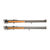 A cased double-barrelled over-and-under rifle by Hambrusch with three extra barrels