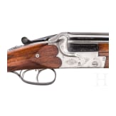 A Merkel over-and-under rifle with Zeiss scope, interchangeable O/U combination barrel with Zeiss scope, interchangeable O/U shotgun barrel