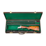 A Merkel over-and-under rifle with Zeiss scope, interchangeable O/U combination barrel with Zeiss scope, interchangeable O/U shotgun barrel
