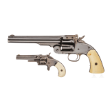 A cased Smith & Wesson 2nd Model Schofield Single Action Revolver and a No. 1 3rd issue revolver