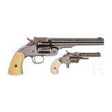 A cased Smith & Wesson 2nd Model Schofield Single Action Revolver and a No. 1 3rd issue revolver