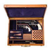 A cased Smith & Wesson 2nd Model Schofield Single Action Revolver and a No. 1 3rd issue revolver
