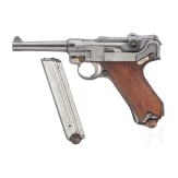 A DWM 1917 marked Luger 08 pistol with 2 magazines with matching numbers