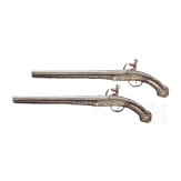A pair of Ottoman silver-mounted oriental flintlock pistols, circa 1820/30