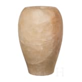 An Egyptian alabaster canopic jar, 2nd - 1st millenium B.C.