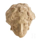 A Greek-Hellenistic terracotta head of Heracles, 3rd - 2nd century B.C.