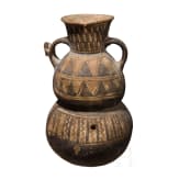 A Peruvian clay vessel, Peru, circa 1000 A.D.