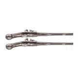 A pair of fine deluxe flintlock pistols with chiselled mounts, S. Charlet à Lyon, circa 1700