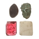 Ein Miniatur-Satyrkopf aus Bronze, eine Gemme mit Minervakopf und zwei geschnittene Steine, r&ouml;misch, 1. - 3. Jhdt.