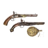 Two Moroccan flintlock pistols and a powder flask, 19th./20th century