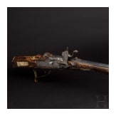 A wheellock rifle with staghorn stock, a historicism reproduction composed of original parts