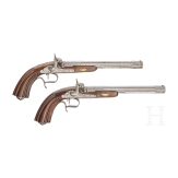 A pair of cased reproduction percussion pistols, Spain, circa 1980