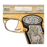 A cased Norinco M 84 in gold finish