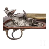 A seven-barrelled flintlock pistol, England, dated 1818