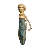 A Roman glass unguent bottle with figural gold lid, 1st century