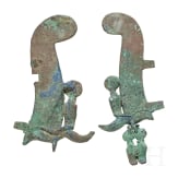 Two halves of Egyptian feather crowns with Uraeus serpents, bronze, 2nd - 1st millennium B.C.