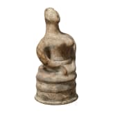 A Cretan-Minoan terracotta figurine, 13th - 11th century B.C.