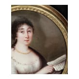 A French miniature portrait of a young woman with letter, Paris, circa 1810