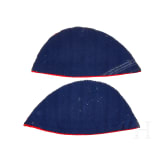 A visor cap and assorted insignia
