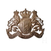 A visor cap and assorted insignia