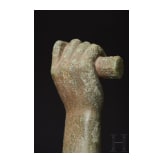 A Roman bronze fragment of an arm and a club on a pedestal, 1st - 2nd century
