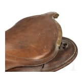 Saddle made of brown leather with pistol holster, 19th century