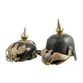 Zwei Helmfragmente und zwei Adlerembleme, um 1900