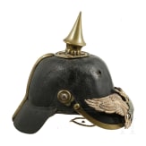 Zwei Helmfragmente und zwei Adlerembleme, um 1900