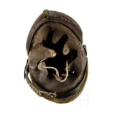 Zwei Helmfragmente und zwei Adlerembleme, um 1900