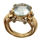 A gold and aquamarine ring