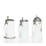 Three German or Bohemian pewter-mounted milk glass jugs, circa 1800