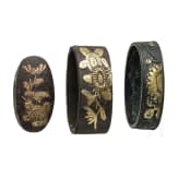 Three Japanese pieces of sword mountings, late Edo period