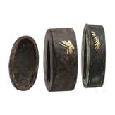 Three Japanese pieces of sword mountings, late Edo period