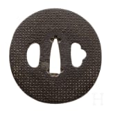 A Japanese tsuba, circa 1800
