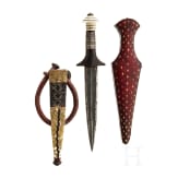 A North African Tuareg dagger, circa 1900, and a dagger case