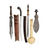 A small collection of African and South Asian edged weapons