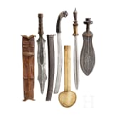 A small collection of African and South Asian edged weapons