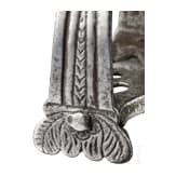 A carved German (?) stirrup, circa 1600