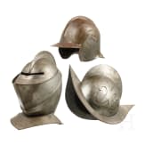 Three helmets, collector's replicas in the style of the 16th/17th century